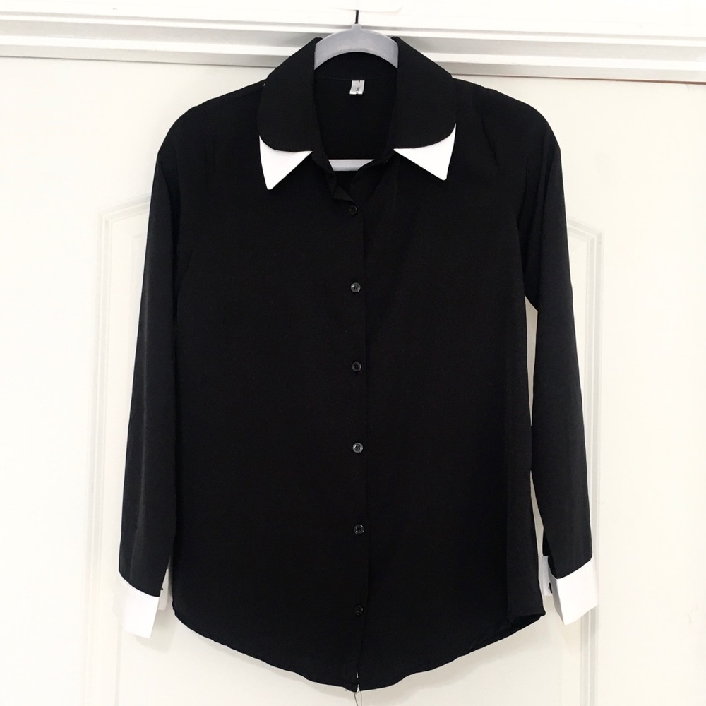 Contrasting detail black blouse